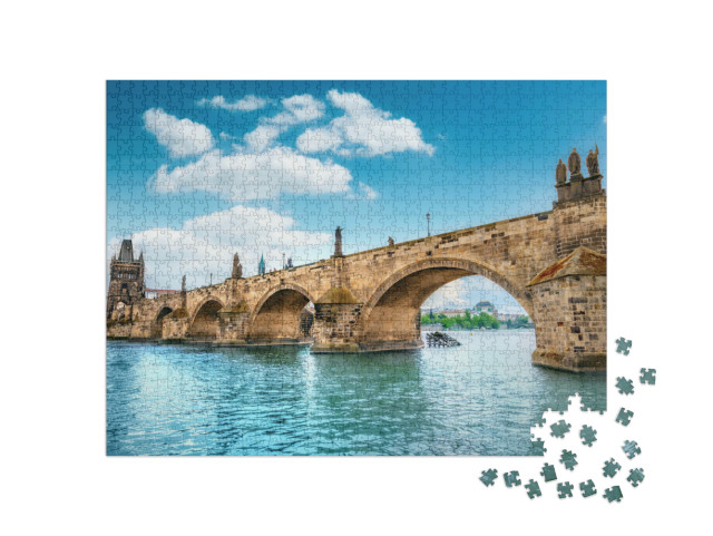 Puzzle 1000 Teile „Karlsbrücke, Prag, über dem blauen Wasser der Moldau“