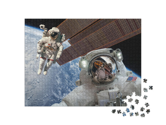 Puzzle 1000 Teile „Internationale Raumstation und Astronauten im Weltraum über dem Planeten Erde“