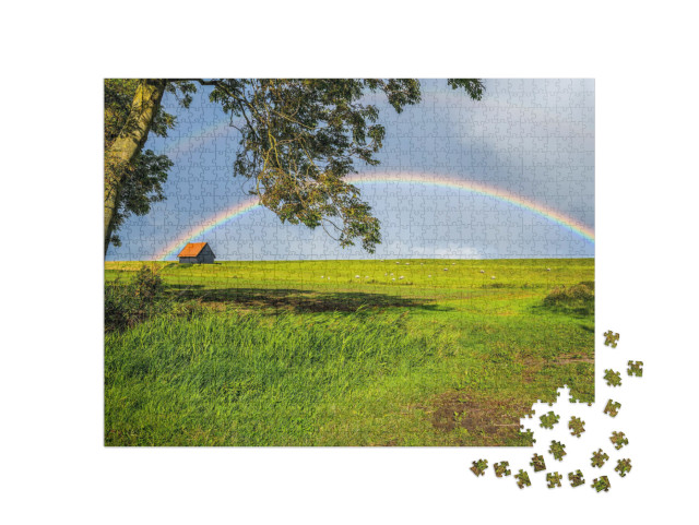 Puzzle 1000 Teile „Regenbogen über einer hügeligen Weide“