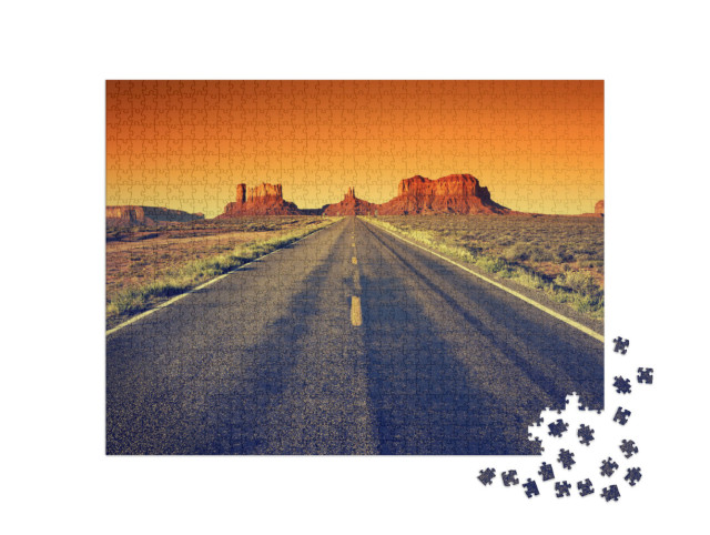 Puzzle 1000 Teile „Straße zum Monument Valley bei Sonnenuntergang, USA“