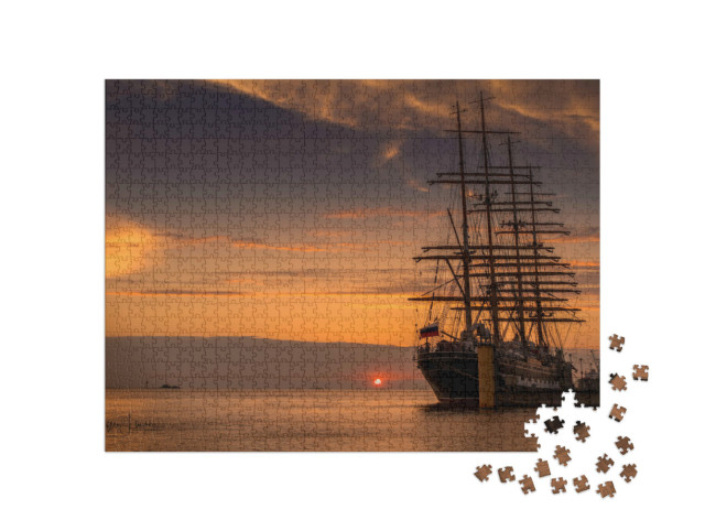 Puzzle 1000 Teile „Segelschiff zurück im Hafen: Sonnenuntergang an der Nordsee“