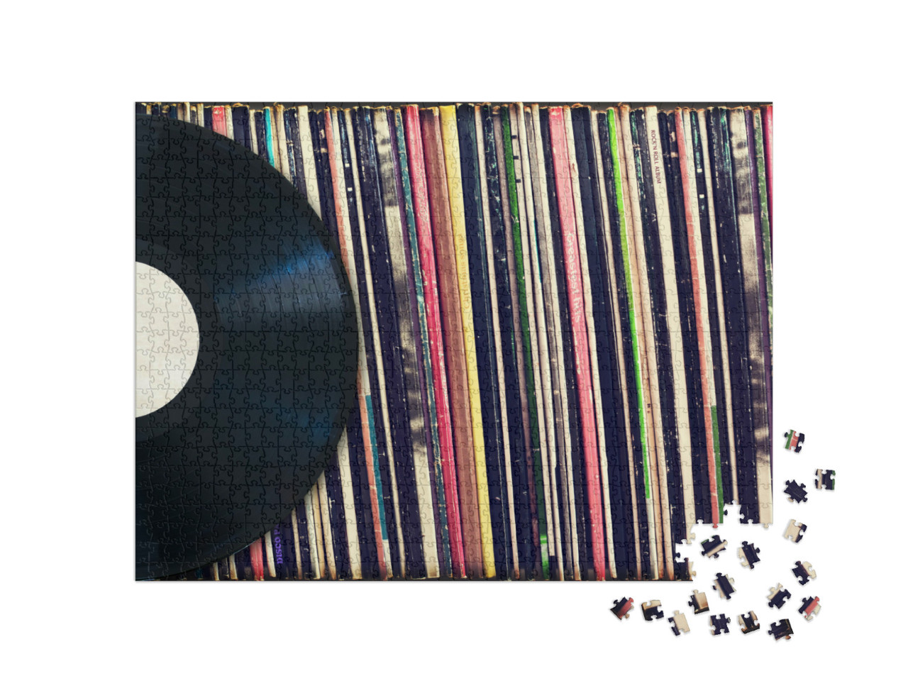 Puzzle 1000 Teile „Vinyl-Schallplatte vor einer Sammlung von Alben“