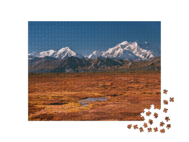 Puzzle 1000 Teile „Alaskas Mount Denali an einem klaren Tag mit blauem Himmel“