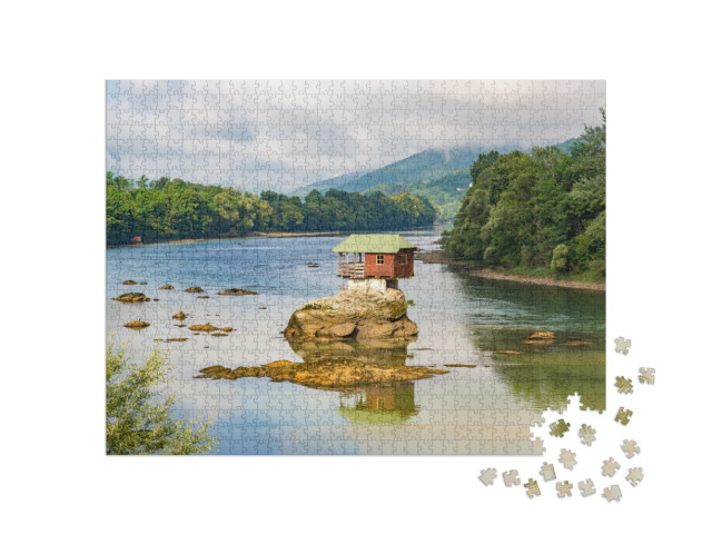 Puzzle 1000 Teile „Haus im Fluss Drina bei Bajina Basta, Serbien“