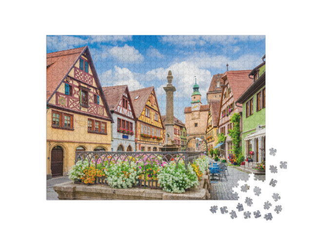 Puzzle 1000 Teile „Rothenburg ob der Tauber an sonnigem Tag mit blauem Himmel“