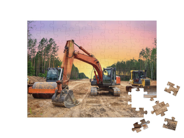 Puzzle 100 Teile „Bulldozer, Bagger und Bodenverdichter bei Straßenbauarbeiten“