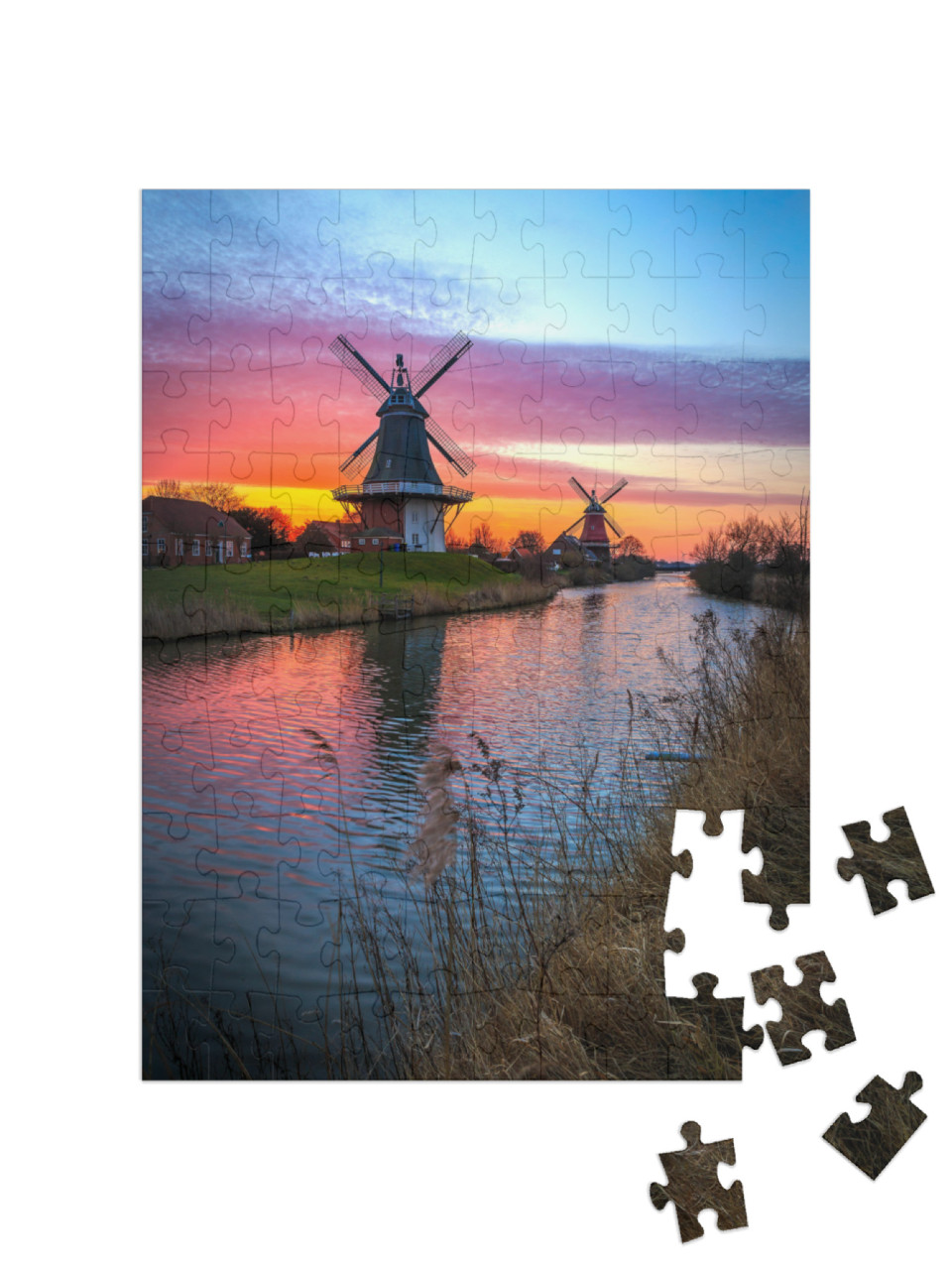 Puzzle 100 Teile „Zwillingsmühlen von Greetsiel, Ostfriesland bei Sonnenaufgang“