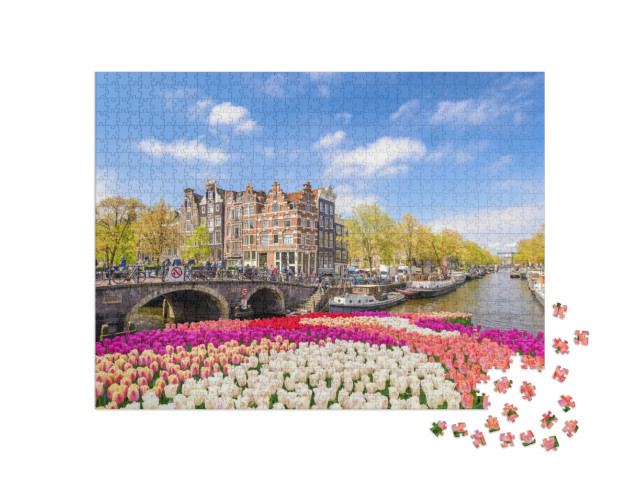 Puzzle 1000 Teile „Amsterdam: Kanalufer mit Tulpenblüte im Frühling“