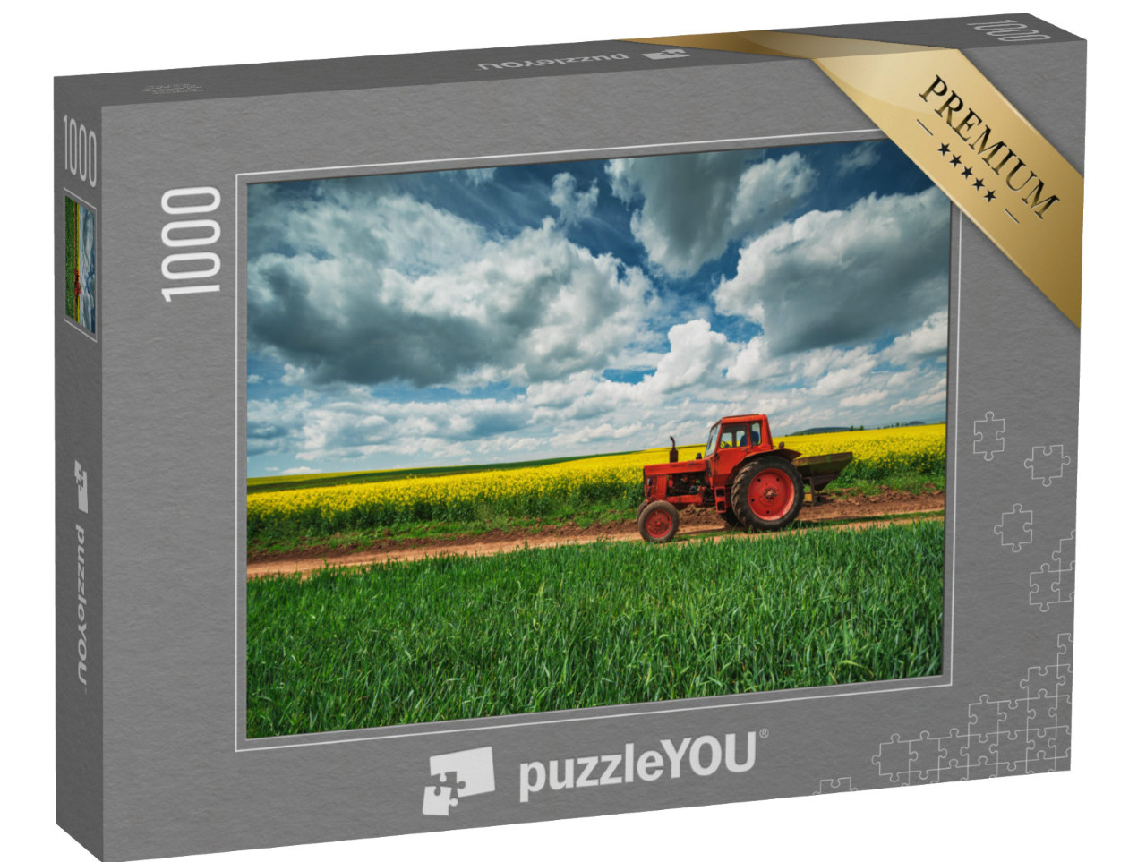 Puzzle 1000 Teile „Roter Traktor mit Anhänger vor einem Rapsfeld, Oxfordshire“