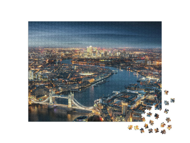 Puzzle 1000 Teile „Luftaufnahme von London: Tower Bridge am Abend“