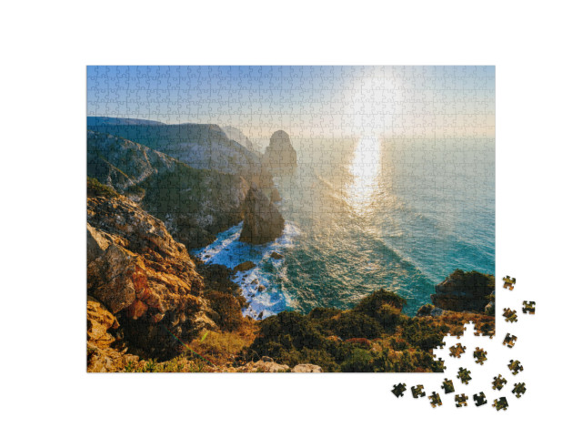 Puzzle 1000 Teile „Sonnenuntergang über der Küste von Portugal“