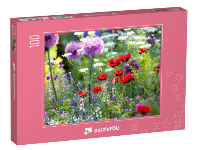 Puzzle 100 Teile „Sonnenüberfluteter Wildblumengarten“
