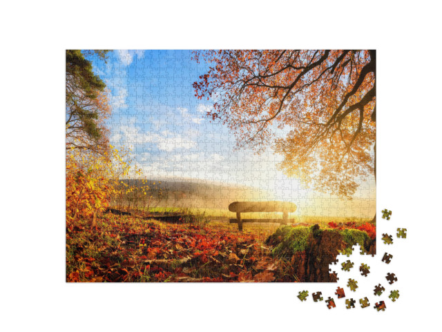 Puzzle 1000 Teile „Eine Holzbank zum Ausruhen in herbstlicher Landschaft“