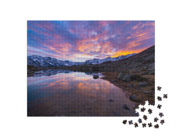 Puzzle 1000 Teile „Hochalpiner See in den italienischen Alpen“
