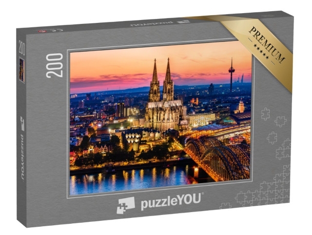 Puzzle 200 Teile „Wunderschönes Nachtpanorama des Kölner Doms, der Hohenzollernbrücke und des Rheins“