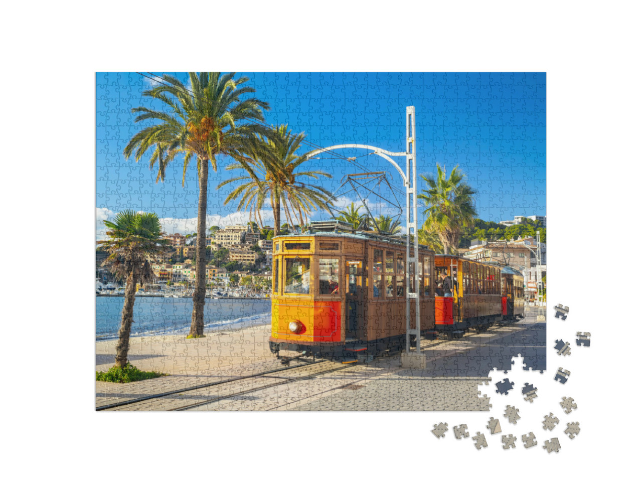 Puzzle 1000 Teile „Berühmte orangene Straßenbahn fährt von Soller nach Port de Soller, Mallorca, Spanien“