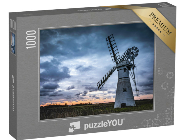 Puzzle 1000 Teile „Eine Mühle auf einem Feld vor dem Hintergrund des Sonnenuntergangs“