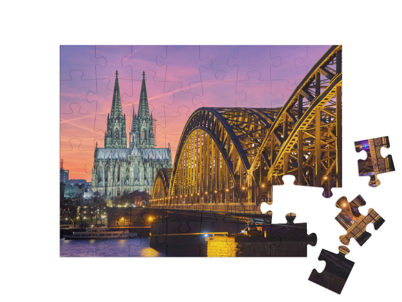 Puzzle 48 Teile „Kölner Dom und Hohenzollernbrücke bei Sonnenuntergang“