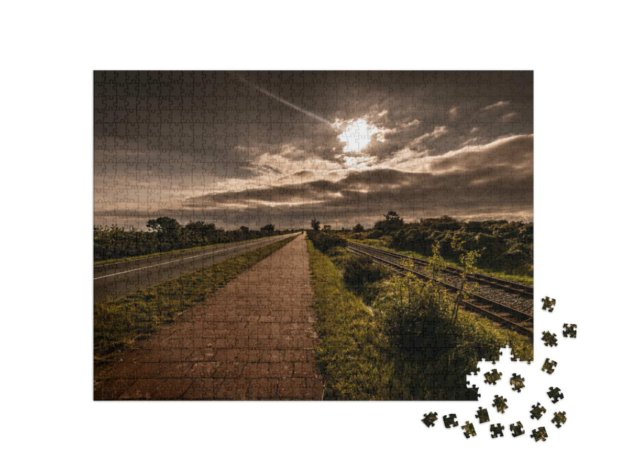 Puzzle 1000 Teile „Malerischer Blick auf Schienen und Straße in Borkum“
