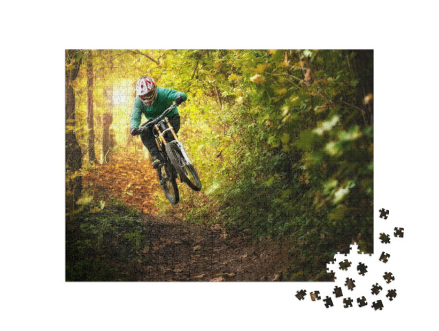 Puzzle 1000 Teile „Mountainbiker im Herbstwald“