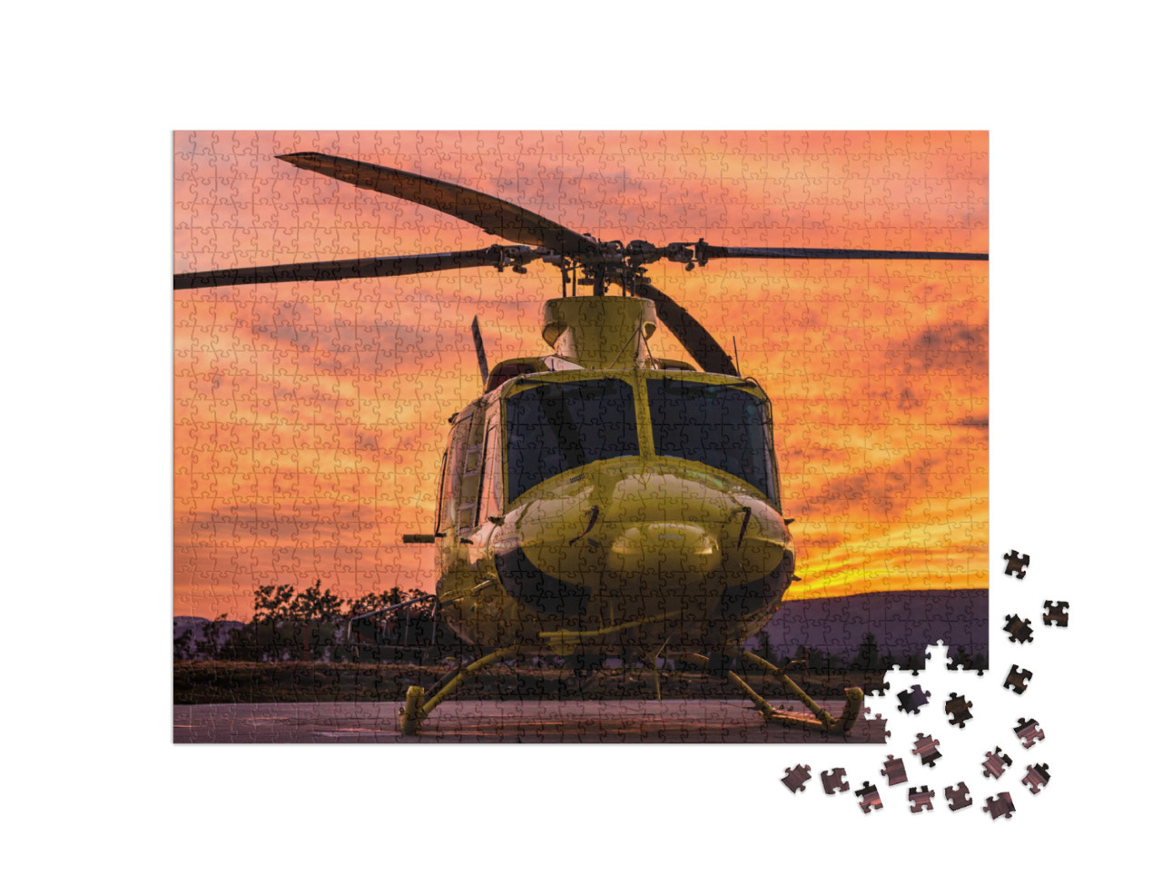 Puzzle 1000 Teile „Hubschrauber im spektakulären Sonnenuntergang“