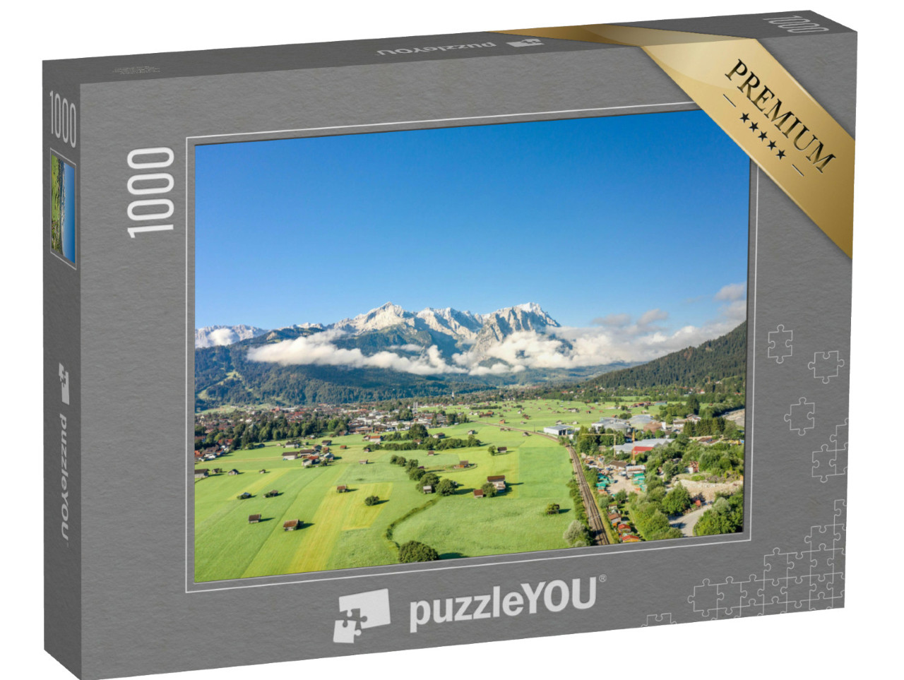 Puzzle 1000 Teile „Garmisch-Partenkirchen mit Blick auf die Zugspitze im Nebel“