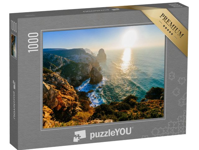 Puzzle 1000 Teile „Sonnenuntergang über der Küste von Portugal“