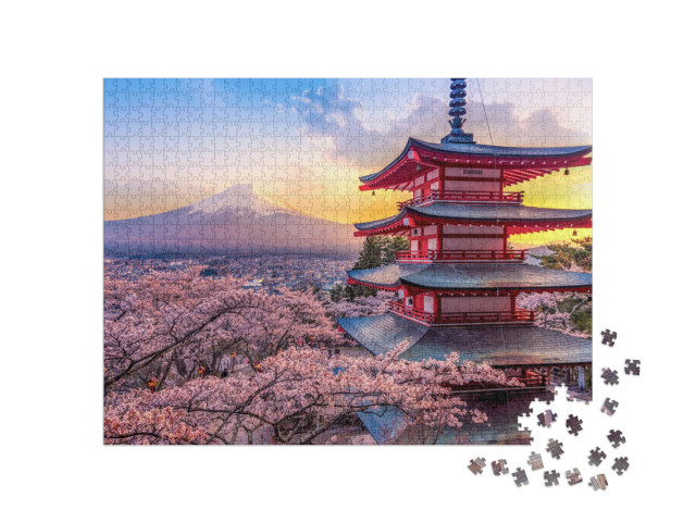 Puzzle 1000 Teile „Kirschblüte am Berg Fuji und die Chureito-Pagode bei Sonnenuntergang, Japan“