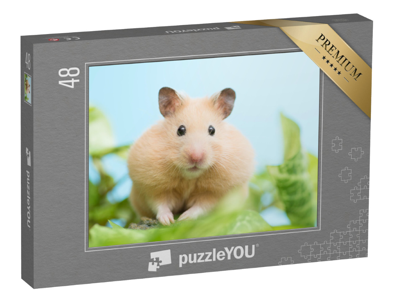 Puzzle 48 Teile „Goldhamster umringt von grünen Blättern“