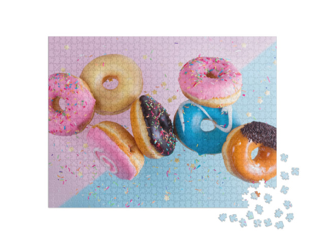 Puzzle 1000 Teile „Fliegende Donuts“