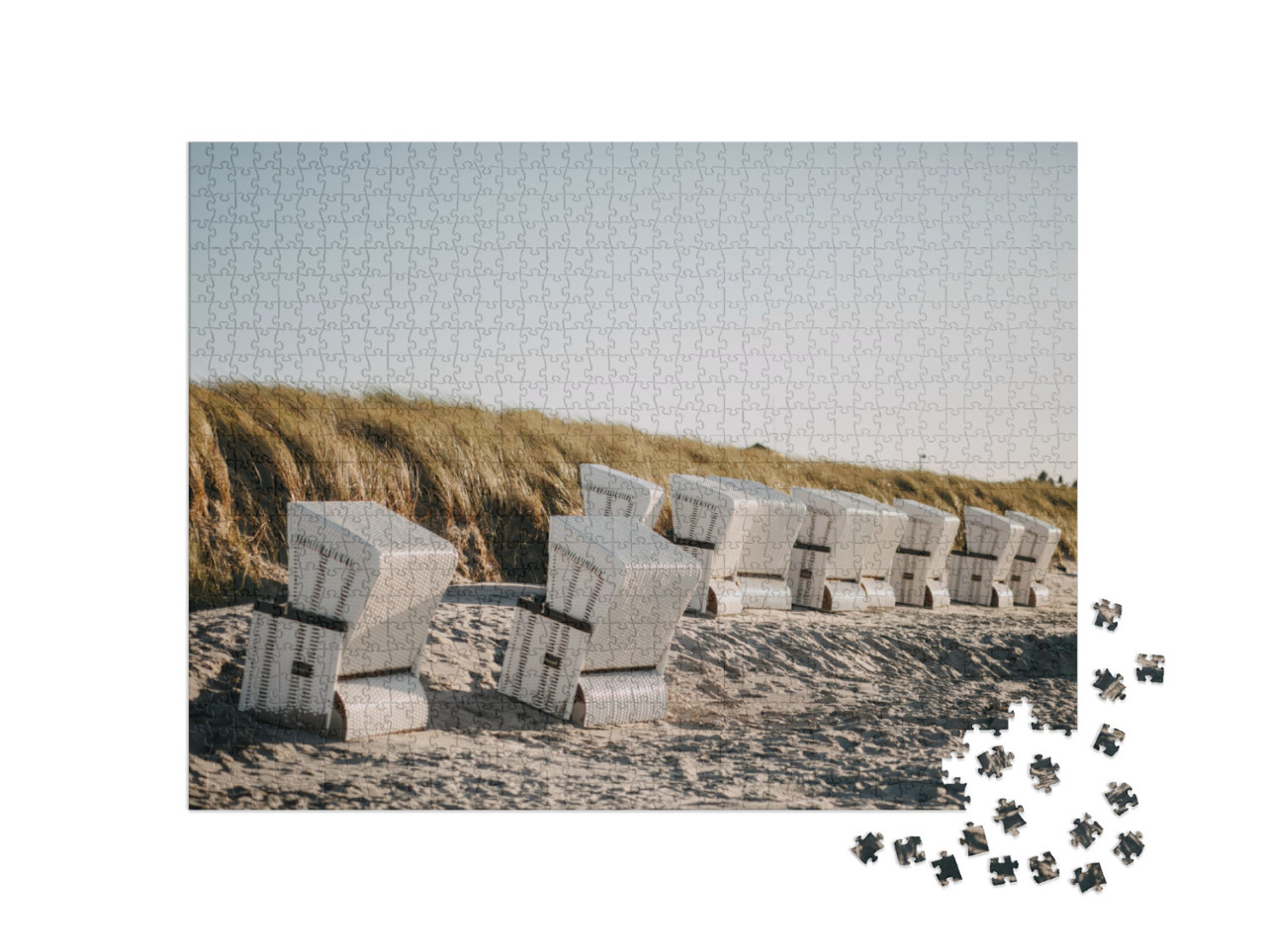 Puzzle 1000 Teile „Foto von überdachten Strandkörben bei Wind“