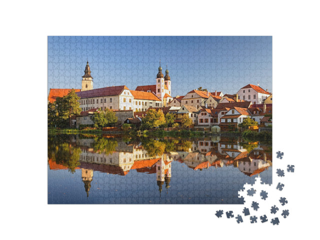 Puzzle 1000 Teile „Blick auf Telc über den Teich mit Reflexionen, Südmähren, Tschechische Republik.“