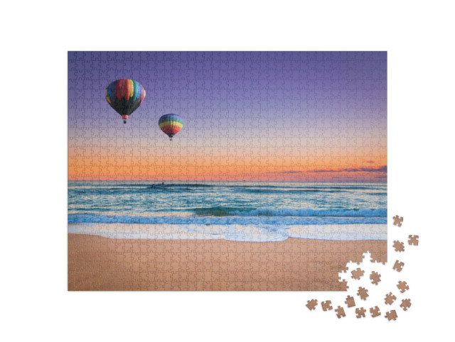 Puzzle 1000 Teile „Heißluftballon über dem Strand von New South Wales, Australien“