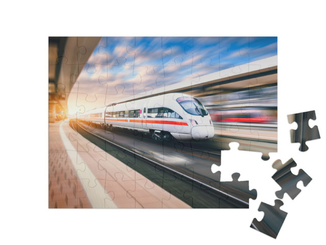 Puzzle 48 Teile „ICE bei der Durchfahrt durch den Bahnhof“