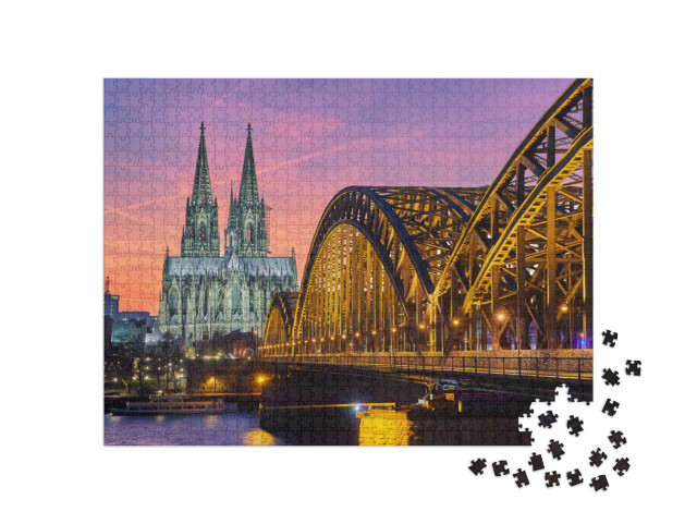 Puzzle 1000 Teile „Kölner Dom und Hohenzollernbrücke bei Sonnenuntergang“