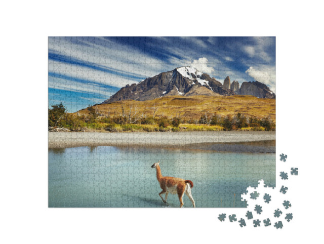 Puzzle 1000 Teile „Guanako beim Überqueren des Flusses im Torres del Paine, Patagonien, Chile“