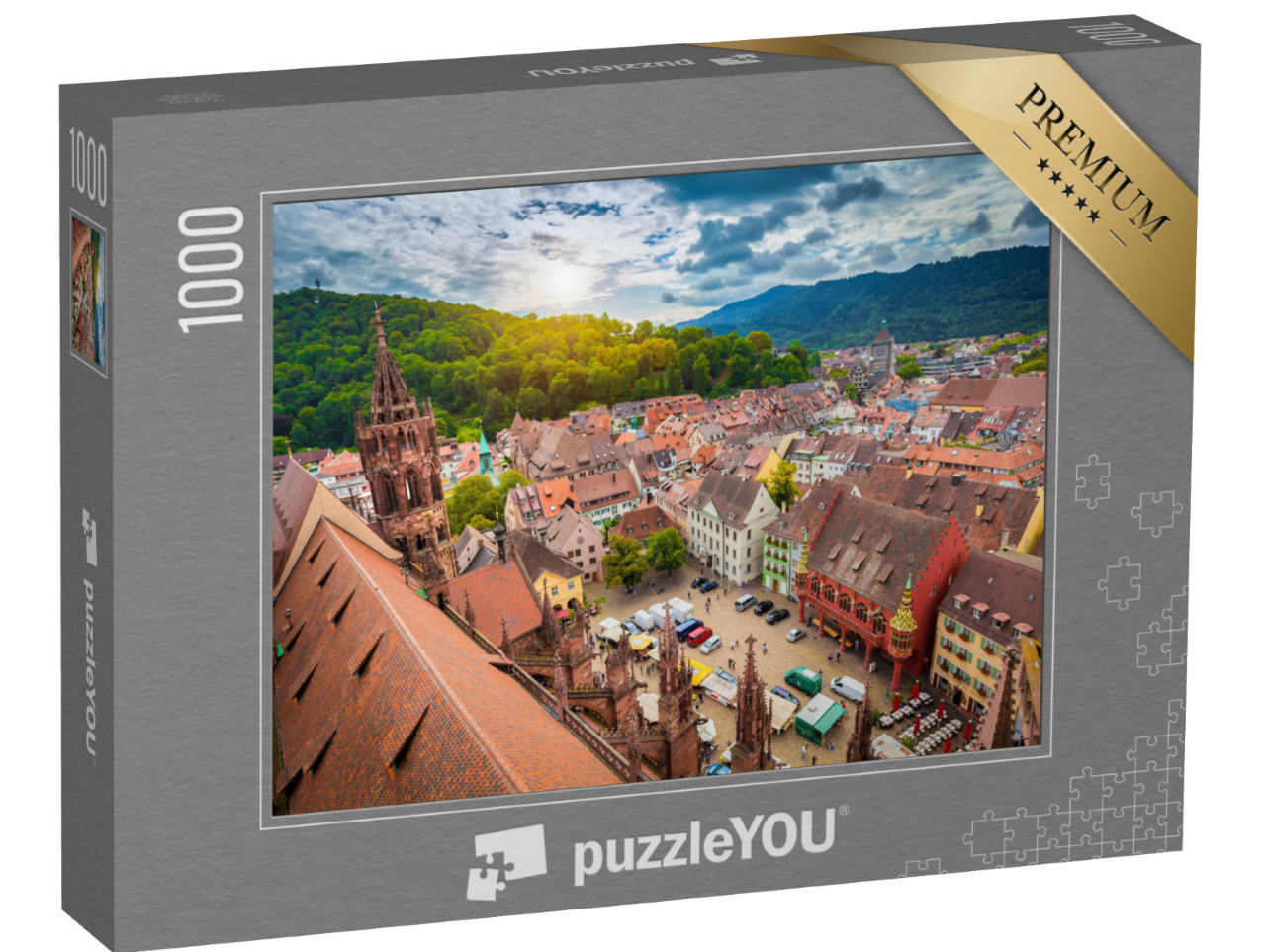 Puzzle 1000 Teile „Historisches Zentrum von Freiburg aus der Luft, Münster im Abendlicht“