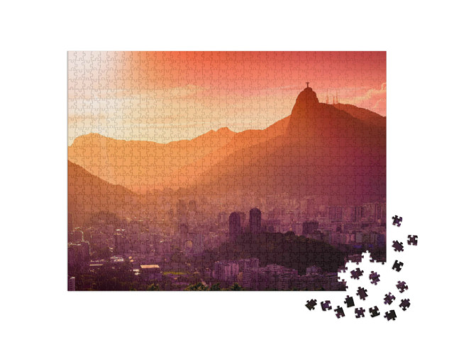Puzzle 1000 Teile „Christusstatue über Rio de Janeiro im glühenden Sonnenuntergang“